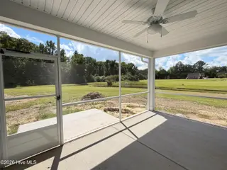 104 Waterfall Lane, Whiteville, NC 28472 – photo 7: screened porch