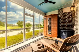 620 Eastwood Park Road 20-C, Sunset Beach, NC 28468 — 4-bedroom townhome in Sea Trail Plantation, Sunset Beach, NC, photo 4 of 63: 1st Floor Screened Porch