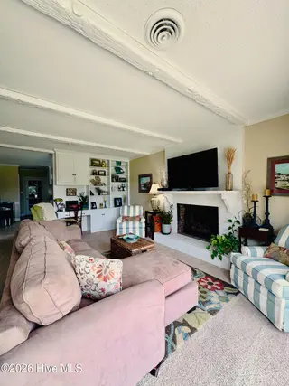 2128 Rivershore Road, Elizabeth City, NC 27909 — 3-bedroom home in Winslow Acres, Elizabeth City, NC, photo 11 of 48: Den w/ Fireplace