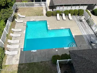 112 Oakleaf Drive 1003-A, Pine Knoll Shores, NC 28512 – photo 5: Shutter on the Sound Pool (b)