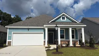 1221 Woodhouse Drive NW, Ash, NC 28420 – photo 1: Lot 30 - 1221 Woodhouse Drive