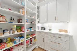 216 Radio Island Road, Morehead City, NC 28557 — 4-bedroom home in Tide Lines, Morehead City, NC, photo 15 of 56: Custom Pantry w/ Built-In Storage