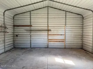 20 Chattawka Drive, Havelock, NC 28532 — 3-bedroom home in Greenfield Heights, Havelock, NC, photo 17 of 20: Detached Garage Interior View 2