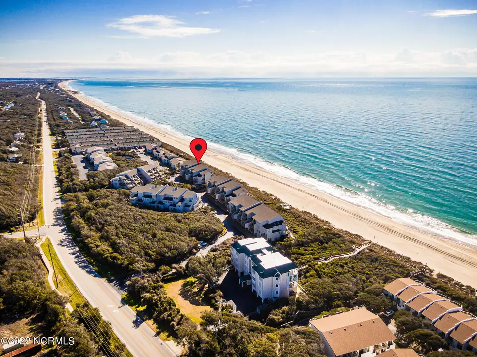 301 Salter Path Road 14 Genesis, Pine Knoll Shores, NC 28512 – photo 1 of 62: Oceanfront condo in Genesis