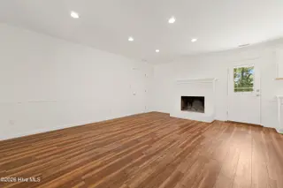 109 Pleasant Drive, Beaufort, NC 28516 – photo 10: Dining and den with fireplace