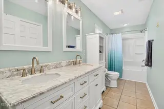 1105 W Oak Island Drive, Oak Island, NC 28465 – photo 20: 25-kahunaphoto