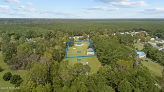 282 Mill Creek Road, Newport, NC 28570 – photo 1: Property with garage/workshop