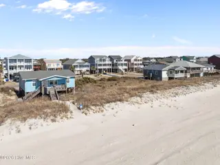 1011 W Beach Drive, Oak Island, NC 28465 – photo 5: 13-web-or-mls-DJI_20260122122427_0282_D
