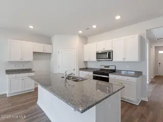 219 Surfside Landing Boulevard Lot 141, Hubert, NC 28539 – photo 11: Centerway25254kitDRHortonL33A2-019-037-1