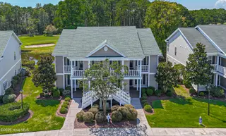 948 Great Egret Circle SW 28d, Sunset Beach, NC 28468 – photo 1: dji_fly_20250906_132316_0079_17572962439