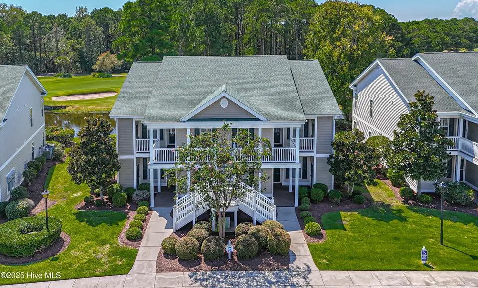 948 Great Egret Circle SW 28d, Sunset Beach, NC 28468 – photo 1 of 36: dji_fly_20250906_132316_0079_17572962439