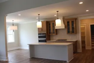 318 Bobbys Drive, Newport, NC 28570 – photo 8: Kitchen and Dining Room View 1 June 26