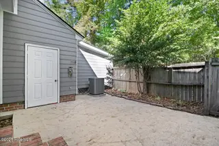3102 Cashwell Drive 3, Goldsboro, NC 27534 – photo 5: Back Porch with Storage Area