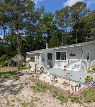 1203 Ocean Trail Court SW, Supply, NC 28462 — 3-bedroom home in Ocean Trail, Supply, NC, photo 1 of 27