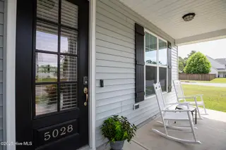 5028 Laurenbridge Lane, Wilmington, NC 28409 – photo 4: Laurenbridge5028-2fprchShaneL33A5322 cop