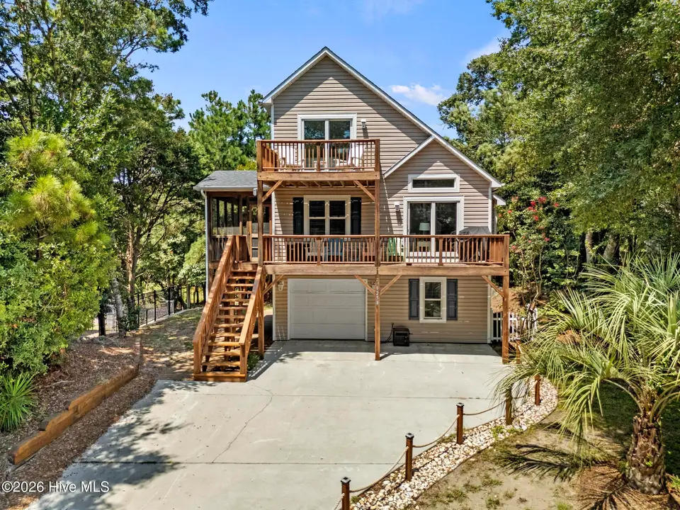 9258 Osprey Ridge Drive, Emerald Isle, NC 28594 – photo 1 of 49: DJI_20260817134915_0147_D