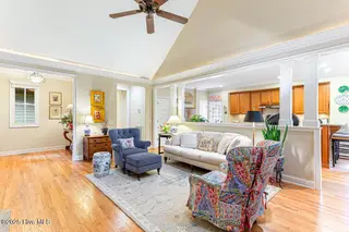 273 Champions Ridge Drive, Southern Pines, NC 28387 – photo 7: Living Room with a view to the kitchen