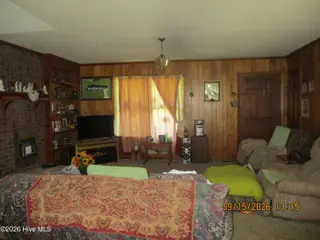7625 Wheat Swamp Road, Lucama, NC 27851 – photo 7: 7625 Wheat Swamp living room1-1
