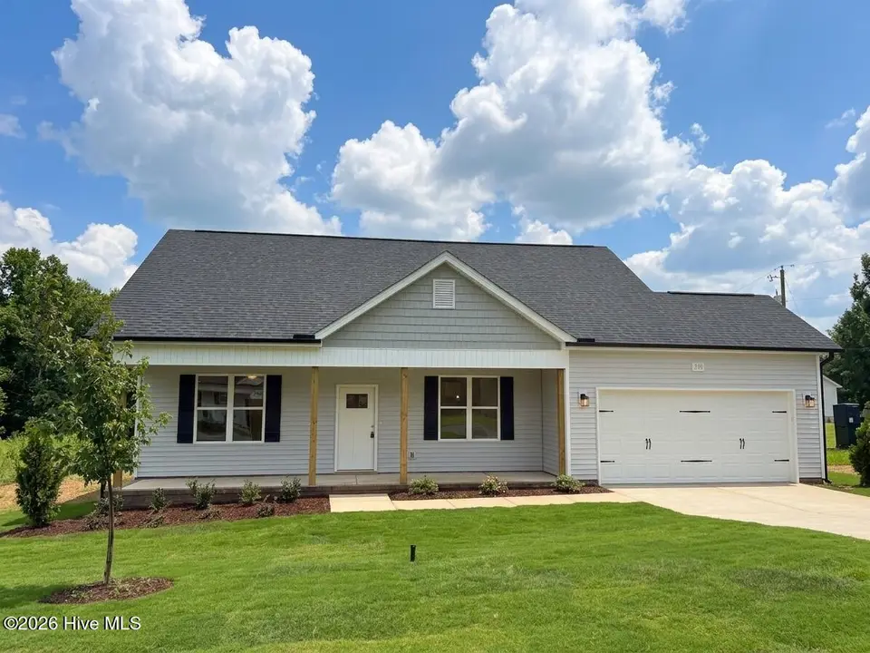 570 Springtooth Drive, Zebulon, NC 27597 – photo 1 of 9: Front Exterior
