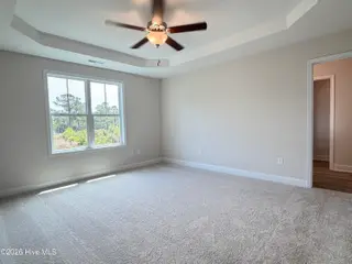 511 Country Club Villa Drive, Shallotte, NC 28470 – photo 12: 511 Country Club Primary Bedroom