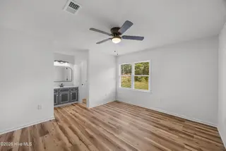 1101 Hunting Ridge Road, Wilmington, NC 28412 — 4-bedroom home in Echo East, Wilmington, NC, photo 14 of 41: Bedroom - 2026-09-26T181202.138