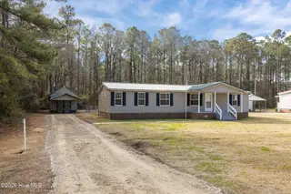4113 N Highway 101, Newport, NC 28570 – photo 1: House with detached workshop/shed