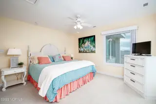 301 Salter Path Road 14 Genesis, Pine Knoll Shores, NC 28512 – photo 24: Primary bedroom suite