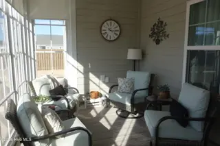 6829 Campbells Ridge Drive SE, Leland, NC 28451 – photo 20: 3 Seasons Room_1_8165
