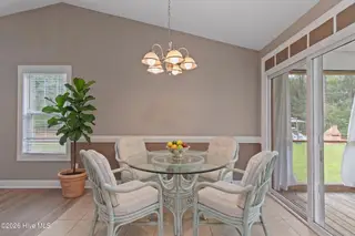 473 Pine Lake Road, Southport, NC 28461 — 4-bedroom home in Boiling Spring Lakes, Southport, NC, photo 13 of 39: Photo 11 dining room AI