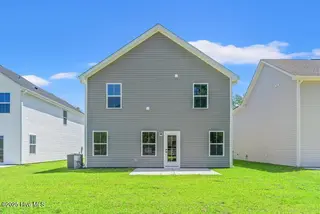 8031 Sterling Oaks Drive NW, Ash, NC 28420 – photo 3: Backyard