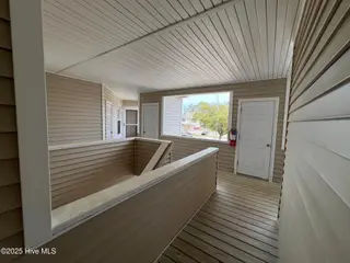 413 Commerce Avenue Unit D, Morehead City, NC 28557 – photo 6: 2nd floor landing top of stairs
