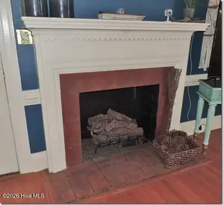 2856a Forest Hills Loop SW, Wilson, NC 27893 – photo 21: 21 _ LR Fireplace