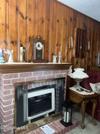 215 Nunn Street, Havelock, NC 28532 – photo 16: Den-fireplace