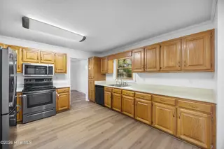 106 Heiress Wynd Drive, Jacksonville, NC 28546 — 3-bedroom home in Northside, Jacksonville, NC, photo 12 of 53: 12_kitchen