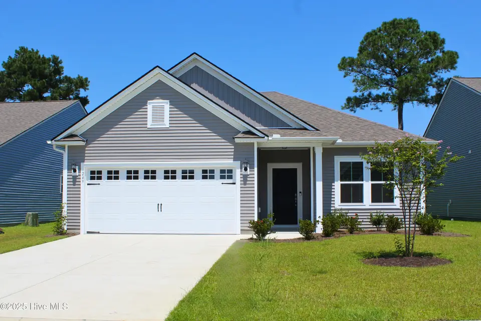 249 Eagle Claw Drive, Carolina Shores, NC 28467 – photo 1 of 1: front