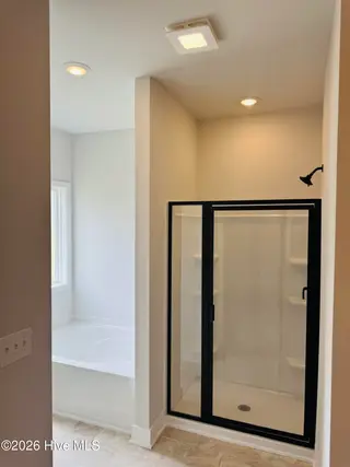 409 S Carey Street Lot 66, La Grange, NC 28551 – photo 12: primary bathroom walkin shower and soaki