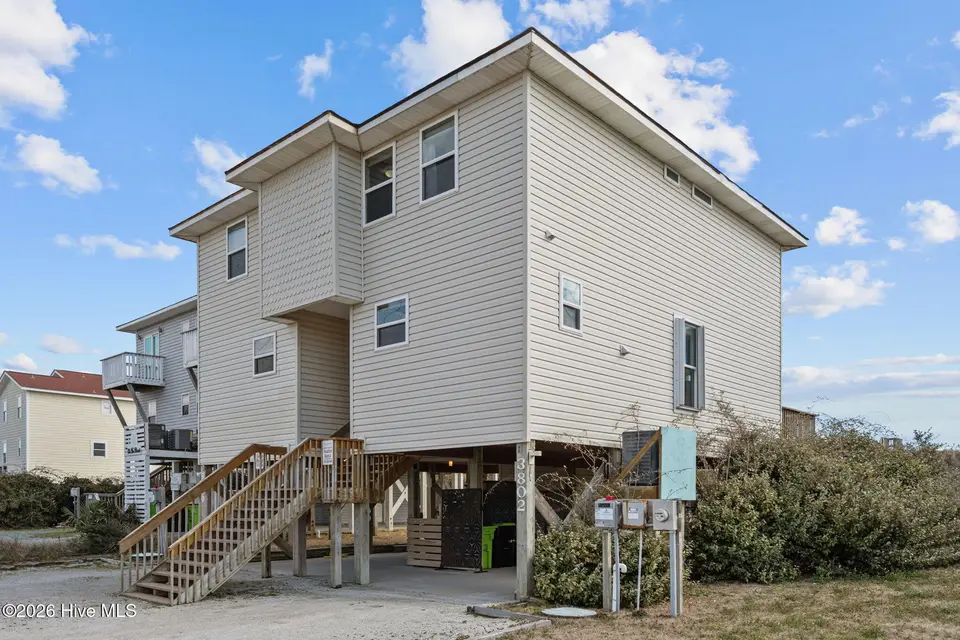 3802 Island Drive, North Topsail Beach, NC 28460 – photo 1 of 49: Ground Floor Southside Front View