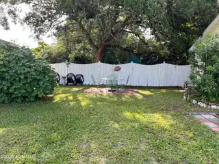 418 Fayetteville Avenue, Carolina Beach, NC 28428 – photo 10: back yard 2