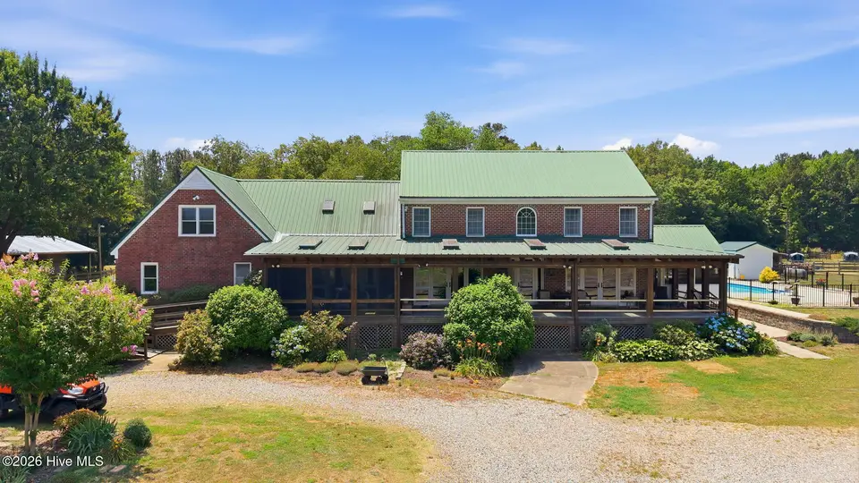 1527 W Castalia Road, Nashville, NC 27856 – photo 1 of 51: 10-web-or-mls-DJI_20260611120349_0823_D