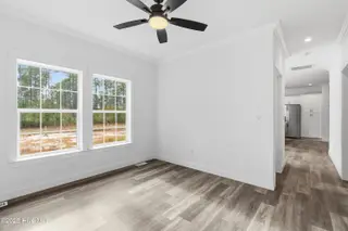 9163 Southern Boulevard SE, Winnabow, NC 28479 — 3-bedroom home, Winnabow, NC, photo 7 of 28: Living room