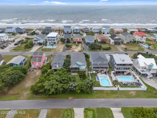210 W Beach Drive, Oak Island, NC 28465 – photo 4: 4-web-or-mls-DJI_20250614135902_0269_D