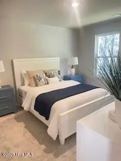 818 Palm Frond Way NW, Calabash, NC 28467 – photo 13: upstairs back bedroom