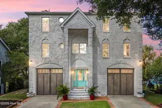 104 SW Yacht Drive, Oak Island, NC 28465 — 5-bedroom waterfront home, Oak Island, NC, photo 1 of 77: 1_virtual twilight
