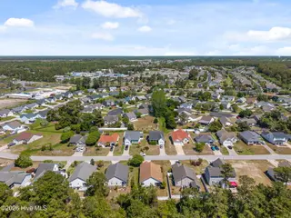5014 N Hampton Drive SE, Southport, NC 28461 – photo 9: 9-web-or-mls-DJI_20260415124208_0401_D