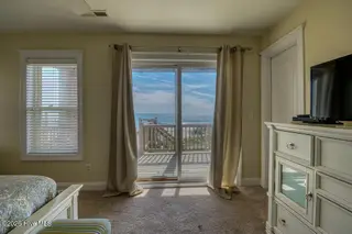 1302 New River Inlet Road, North Topsail Beach, NC 28460 – photo 8: The Greenwood Bedroom 3 Ocean Side