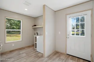 1396 Nixonton Road, Elizabeth City, NC 27909 – photo 21: Side Door/Laundry