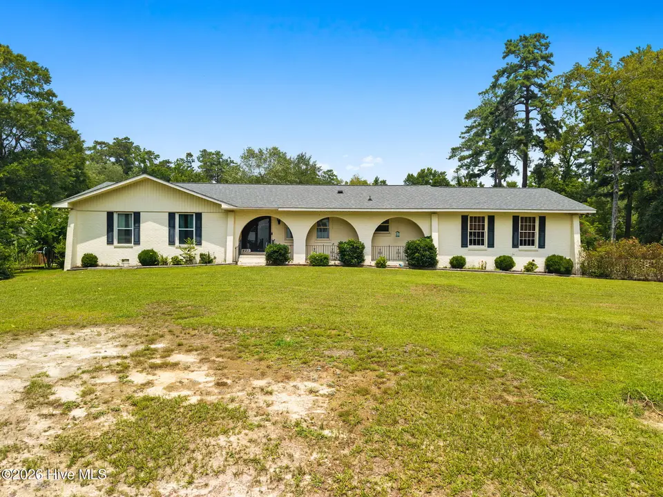 423 S Edgewood Circle, Whiteville, NC 28472 – photo 1 of 51: front center