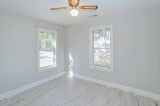 127 NW 10th Street, Oak Island, NC 28465 – photo 12: 127 NW 10th St Oak Island NC-large-015-0