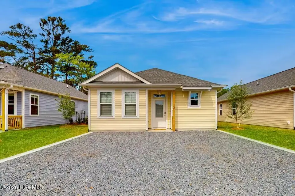 121 NE 75th Street, Oak Island, NC 28465 – photo 1 of 25: 121 NE 75th St, Oak Island