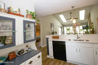 171 Cranes Cove, Vass, NC 28394 – photo 16: 58_Kitchen-Counter-Open-to-Living-Dining